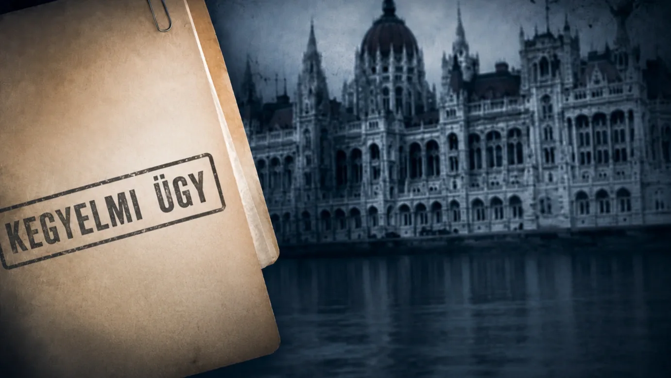 „Kegyelmi ügy” feliratú irat a Parlament épülete előtt, a kegyelmi botrányt vizsgáló bizottságról szóló cikk illusztrációján.