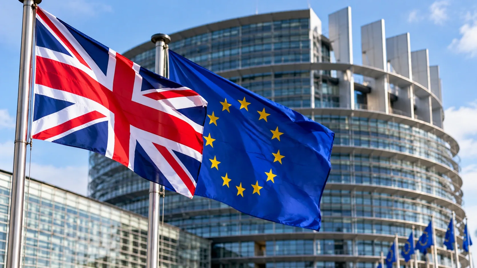Brit és európai uniós zászló egy modern intézményi épület előtt.