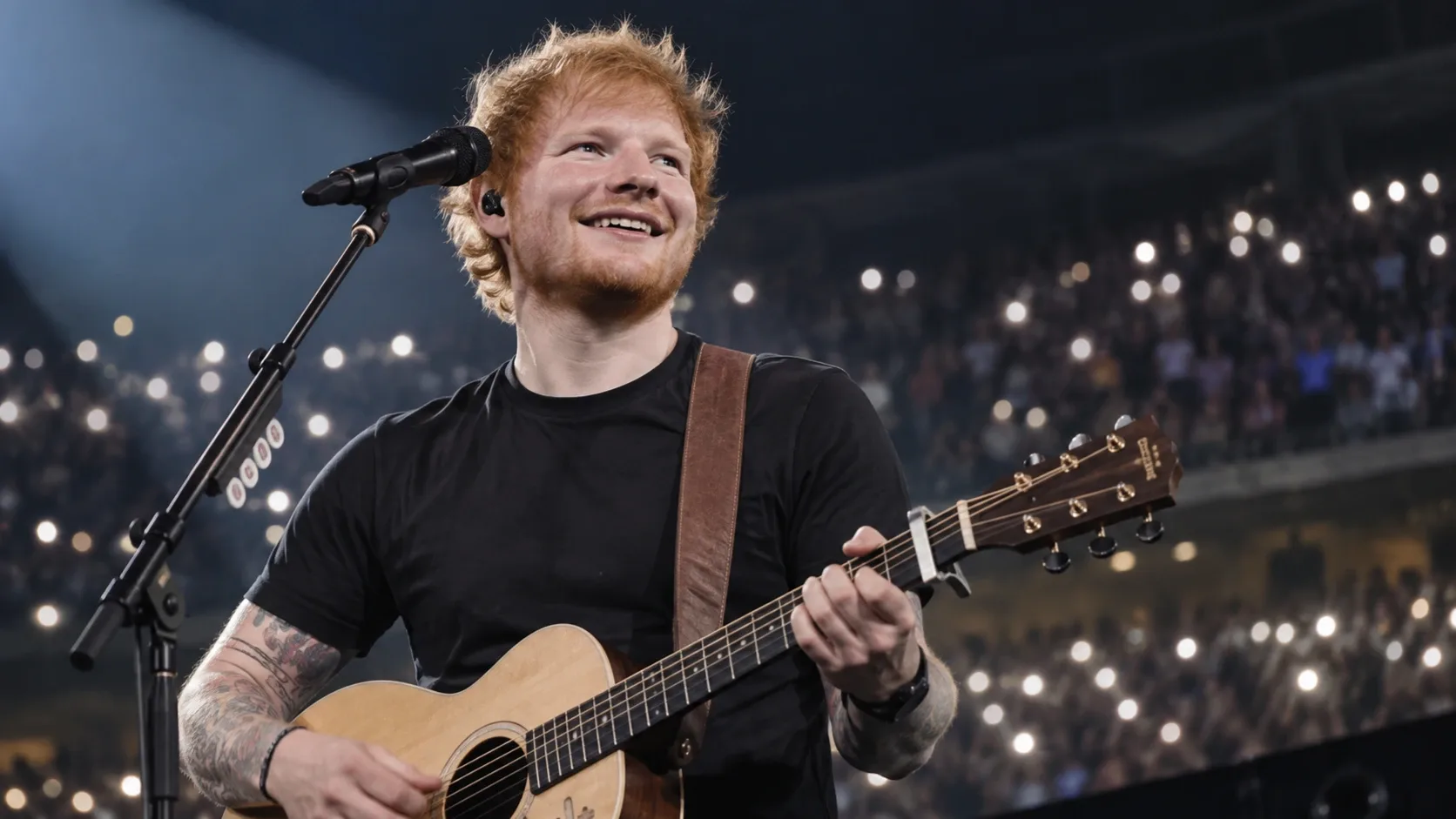 Ed Sheerant ábrázoló illusztráció gitárral egy koncert színpadán.