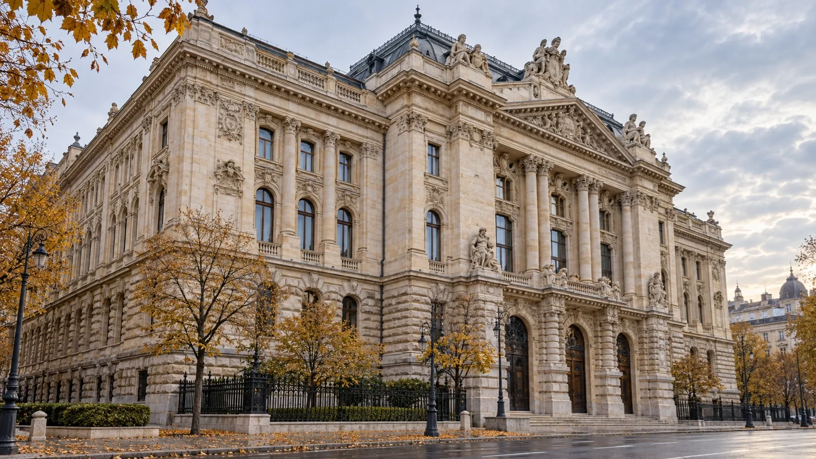 Monumentális, díszes kőhomlokzatú banképületet ábrázoló illusztráció őszi fákkal.